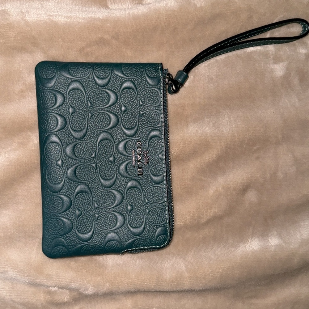 COACH Embossed Signature Wristlet